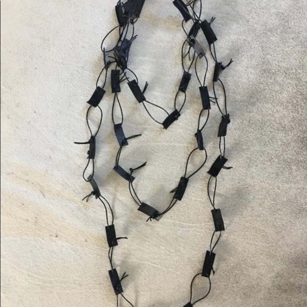 Statement black leather cord and leather strips adjustable necklace XL.